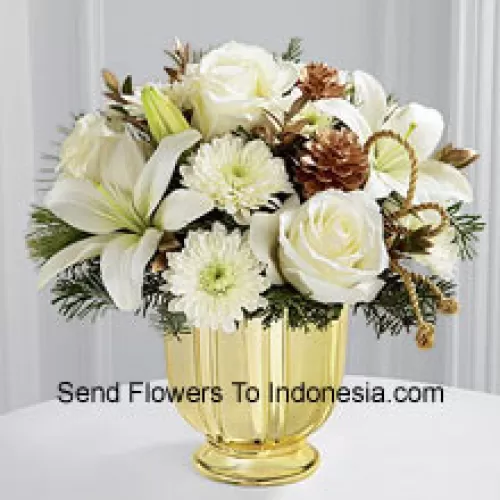 A highly sophisticated expression of the season's most dazzling moments. Snowy white roses, Asiatic lilies and chrysanthemums shed their light and beauty arranged amongst myrtle stems and assorted holiday greens. Accented by gold pinecones and gold cording and placed in a gold pedestal vase, this bouquet creates a wonderful wish for a truly wondrous holiday season. (Please Note That We Reserve The Right To Substitute Any Product With A Suitable Product Of Equal Value In Case Of Non-Availability Of A Certain Product)