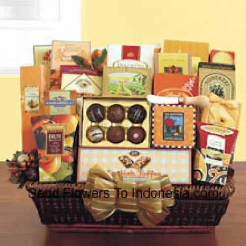 Our Mother's Day Gift Basket is perfect when you need to send a large gift and insure there is plenty of variety for her to enjoy. Our wicker tray basket is brimming with gourmet goodies that she will appreciate, like California smoked almonds, Lindt truffles, a Ghirardelli caramel chocolate bar, Dolcetto wafer cookies, dried fruit, cashew crunch, cheese straws, carrot cake cookies, breadsticks, cheese, a cheese knife, crackers, English toffee, cookies, English tea cookies, toffee pretzels, toffee almonds, LeGrand truffles, and cappuccino mix. (Please Note That We Reserve The Right To Substitute Any Product With A Suitable Product Of Equal Value In Case Of Non-Availability Of A Certain Product)